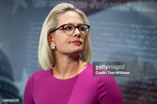 Sen. Kyrsten Sinema, D-Ariz., conducts a news conference introducing legislation that would help offset expenses incurred by new parents in the...