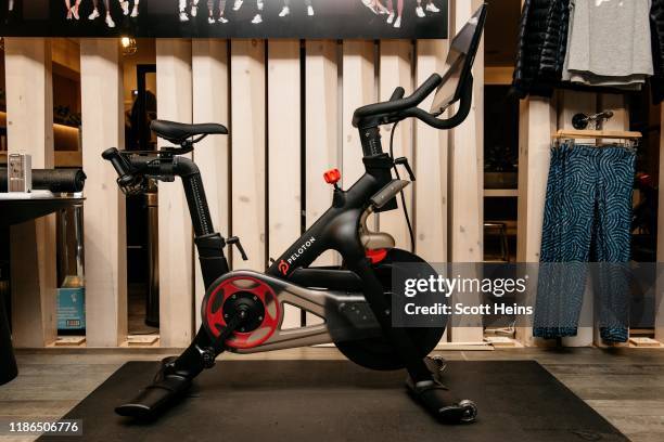 Peloton stationary bike sits on display at one of the fitness company's studios on December 4, 2019 in New York City. Peloton and its model of...