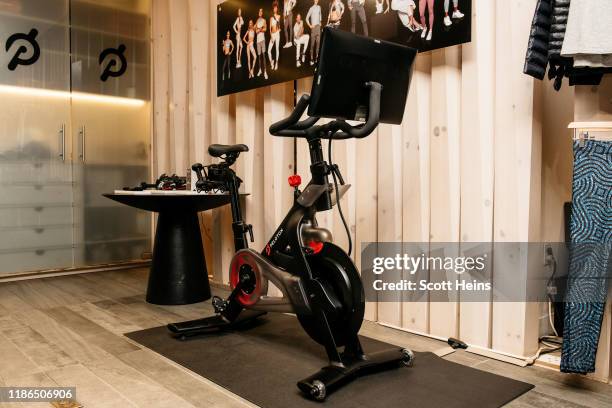 Peloton stationary bike sits on display at one of the fitness company's studios on December 4, 2019 in New York City. Peloton and its model of...