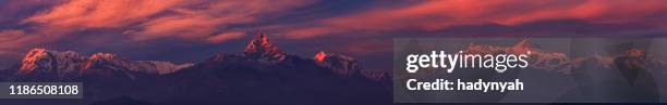 sunset over annapurna range, nepal - himalayas stock pictures, royalty-free photos & images