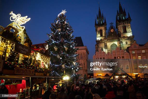 General view of the illuminated Old Town Square with a Christmas tree at the Christmas market on December 4, 2019 in Prague, Czech Republic.