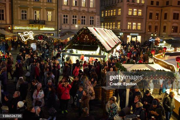 View of the illuminated Christmas market at the Old Town Square on December 4, 2019 in Prague, Czech Republic.