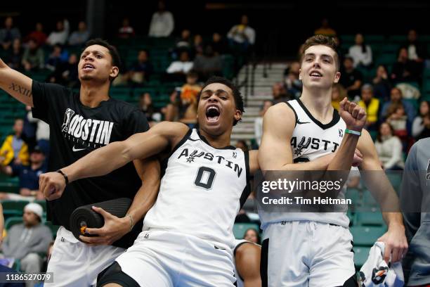 Keldon Johnson of the Austin Spurs and Daulton Hommes celebrate a basket during the fourth quarter against the Texas Legends on December 4th, 2019 at...