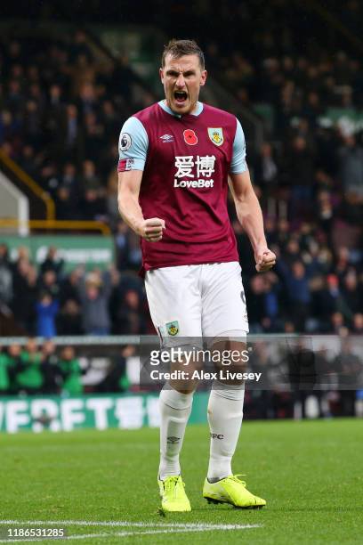 Chris Wood of Burnley celebrates after scoring his team's second goal during the Premier League match between Burnley FC and West Ham United at Turf...