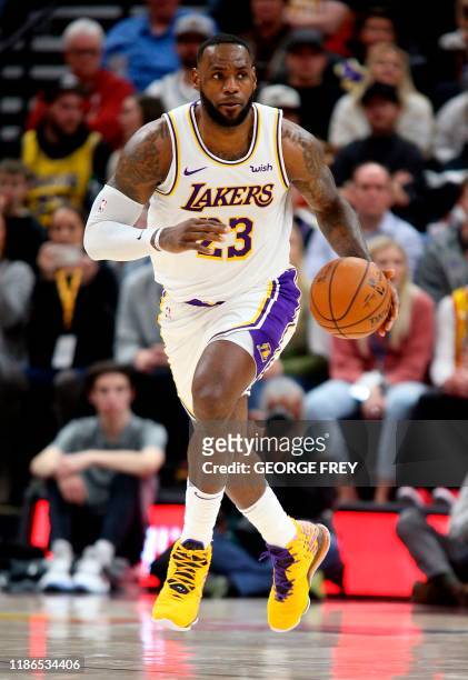 Los Angeles Lakers forward LeBron James brings the ball down court during an NBA game against the Utah Jazz in Salt Lake City, Utah on December 4,...