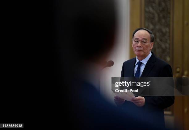 Chinese Vice President Wang Qishan speaks to representatives of the Sino-Russian Friendship Committee for Peace and Development at the Great Hall of...