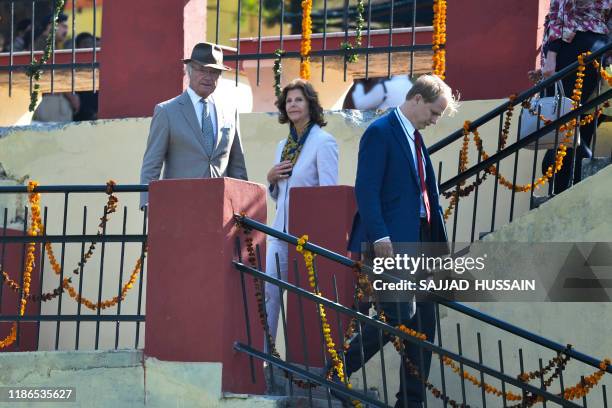 Sweden's King Carl XVI Gustaf and Queen Silvia attend a Ganga Arti Puja, a prayer service, on the banks of the Ganga river in Rishikesh on December...