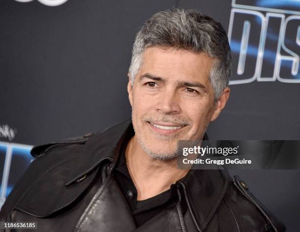 Esai Morales and Mariana Oliveira Morales arrive at the Premiere Of 20th Century Fox's "Spies In Disguise" at El Capitan Theatre on December 4, 2019...