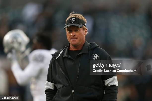 Head coach Jon Gruden of the Oakland Raiders walks on the field before the game against the Los Angeles Chargers at RingCentral Coliseum on November...