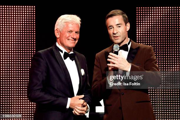 Alexander Schuhmacher and German presenter Kai Pflaume during the Audi Generation Award 2019 at Hotel Bayerischer Hof on December 4, 2019 in Munich,...