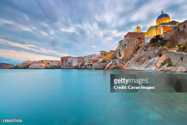 town beach in ermoupoli on syros island in greece. - siros fotografías e imágenes de stock
