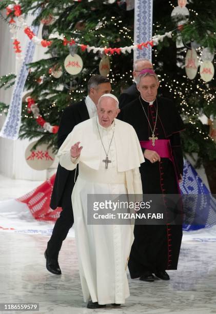 Pope Francis and Prefect of the Papal Household, German Archbishop Georg Gaenswein arrive for an audience to thank donors of this year's St. Peters...