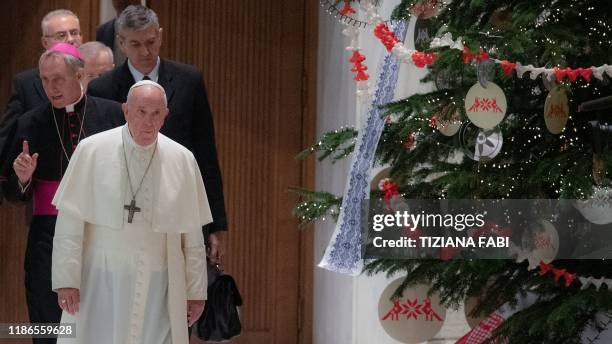 Pope Francis and Prefect of the Papal Household, German Archbishop Georg Gaenswein arrive for an audience to thank donors of this year's St. Peters...