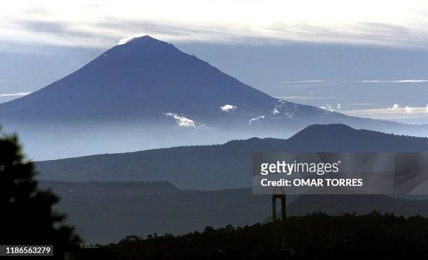 The visra of the Popocatepetl volcano in Mexico City in the morning, 06 November 2000. After several ash exhalations during the weekend, the...