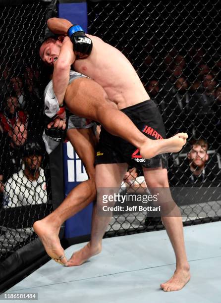 Zelim Imadaev of Russia takes down Danny Roberts of England in their welterweight bout during the UFC Fight Night event at CSKA Arena on November 09,...
