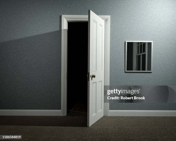 Ominous Front Door Ominous Door Stock-Fotos und Bilder - Getty Images