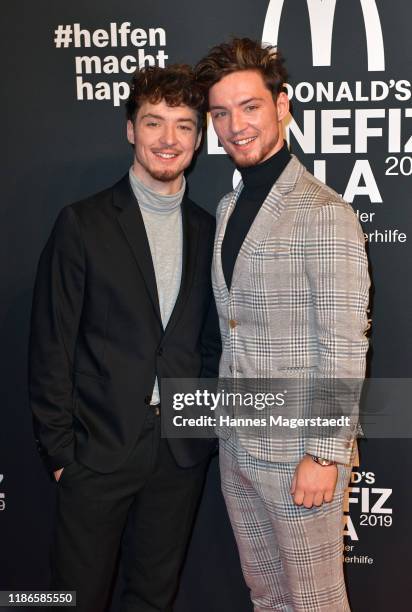 Heiko and Roman Lochmann, music and comedy duo "Die Lochis" attend the "Golden Society - Family & Friends" Charity Gala by McDonald's at Hotel...