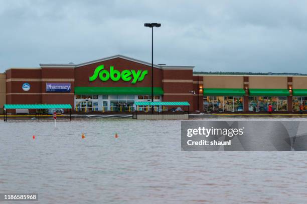 flooded sobeys grocery store - business flood stock pictures, royalty-free photos & images