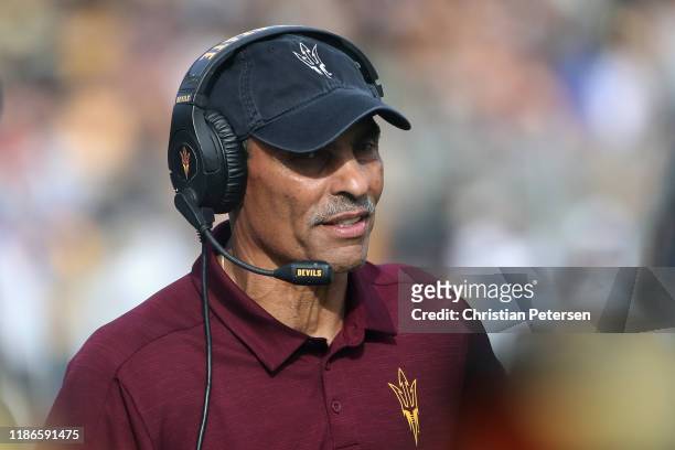 Head coach Herm Edwards of the Arizona State Sun Devils walks the sidelines during the first half of the NCAAF game against the USC Trojans at Sun...