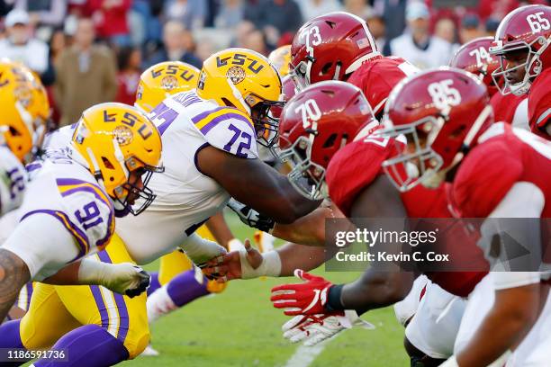 General view of action between the LSU Tigers defensive line and the Alabama Crimson Tide offensive line during the first half in the game at...