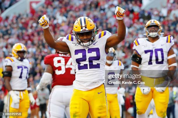 Clyde Edwards-Helaire of the LSU Tigers celebrates after rushing for a 1-yard touchdown during the second quarter against the Alabama Crimson Tide in...