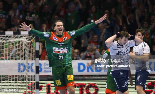 December 2019, Saxony-Anhalt, Magdeburg: Handball, Bundesliga, SC Magdeburg - SG Flensburg-Handewitt, 16th matchday: Erik Schmidt from Magdeburg...