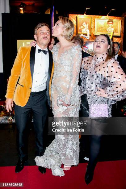 German actor Tom Wlaschiha, model and actress Victoria Jancke and German singer Alina Wichmann alias Alina attend the GQ Men of the Year Award after...