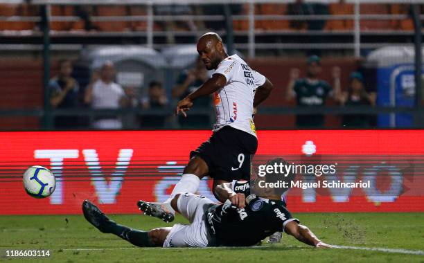 Vagner Love of Corinthians vies the ball with Gustavo Gomez of Palmeiras during a match between Palmeiras and Corinthians for the Brasileirao Series...