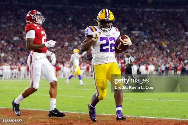 Clyde Edwards-Helaire of the LSU Tigers rushes for a 5-yard touchdown during the fourth quarter against the Alabama Crimson Tide in the game at...