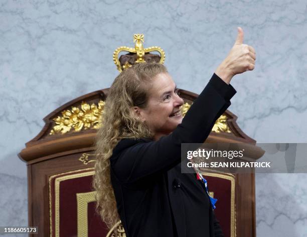 Governor General Julie Payette gives a thumbs up to the gallery as she waits to deliver the Speech from the Throne at the Senate in Ottawa on...