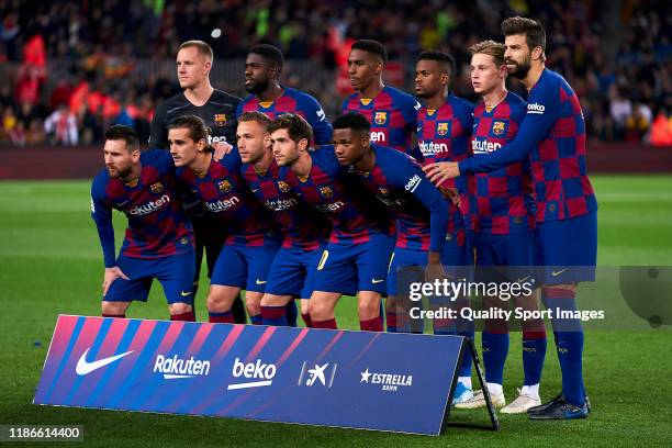 Players of FC Barcelona poses on team's line up prior to the Liga match between FC Barcelona and RC Celta de Vigo at Camp Nou on November 09, 2019 in...