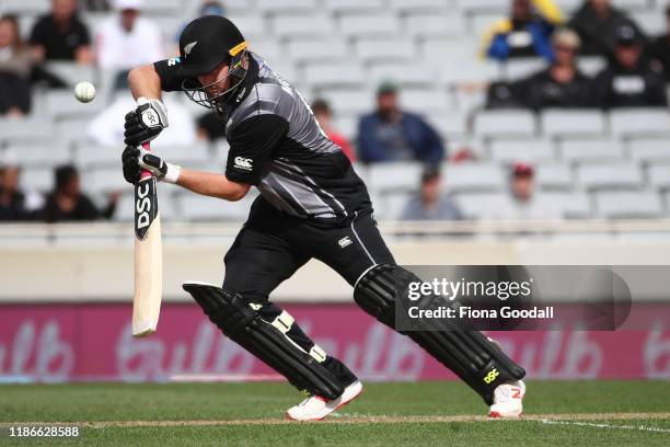 Colin Munro of New Zealand takes a shot during game five of the Twenty20 International series between New Zealand and England at Eden Park on...