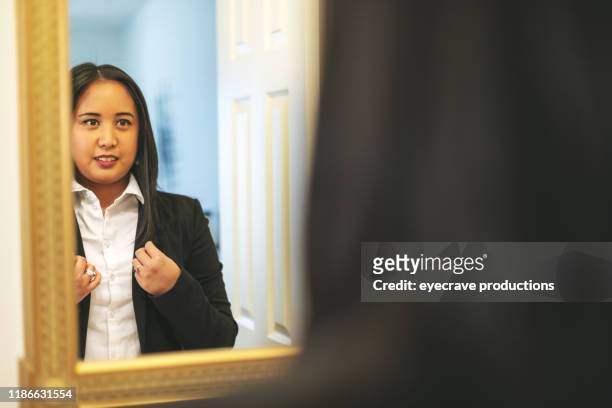 beautiful young female millennial business woman of asian ethnicity preparing for milestone life event - beautiful filipino women stock pictures, royalty-free photos & images
