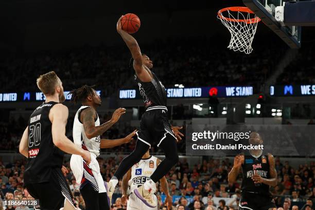 Casey Prather of United attempts to dunk the ball during the round six NBL match between Melbourne United and the Adelaide 36ers at Melbourne Arena...