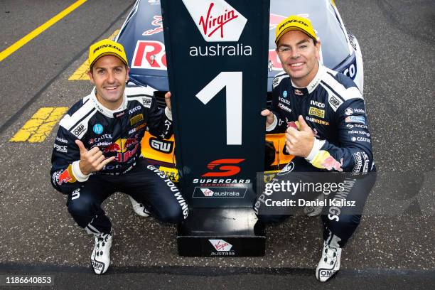 Jamie Whincup driver of the Red Bull Holden Racing Team Holden Commodore ZB and Craig Lowndes driver of the Red Bull Holden Racing Team Holden...