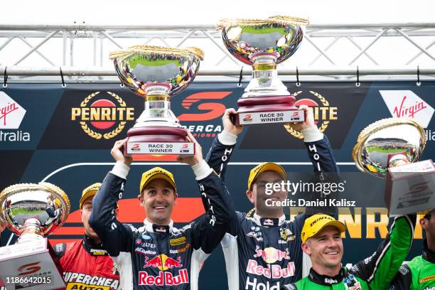 Jamie Whincup driver of the Red Bull Holden Racing Team Holden Commodore ZB and Craig Lowndes driver of the Red Bull Holden Racing Team Holden...