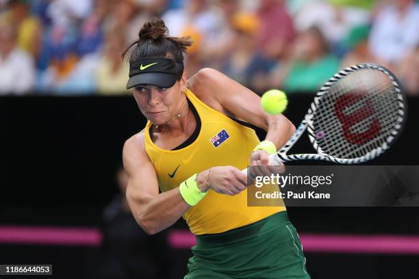 Ajla Tomljanovic of Australia plays a backhand during the match against Pauline Parmentier of France in the 2019 Fed Cup Final tie between Australia...