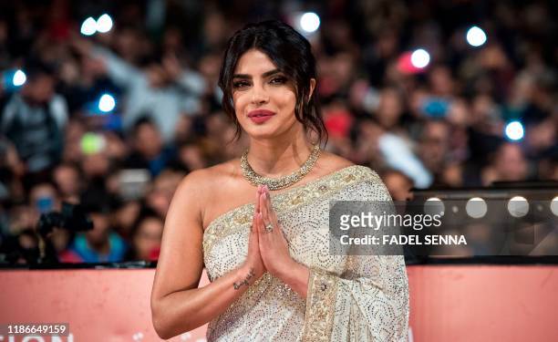 Indian actress Priyanka Chopra attends her tribute on Jemaa El Fnaa square during the 18th Marrakech International Film Festival on December 5, 2019...