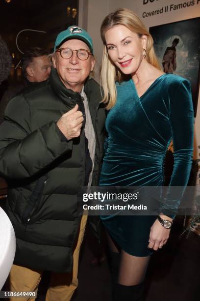 German comedian Otto Waalkes and Kirsten Roschlaub during the Vernissage "COVERED II" of artist Bob Leinders on December 5, 2019 in Hamburg, Germany.