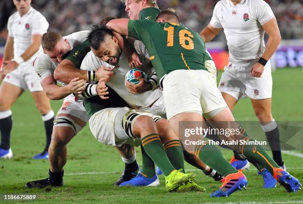 Billy Vunipola of England is tackled during the Rugby World Cup 2019 Final between England and South Africa at International Stadium Yokohama on...
