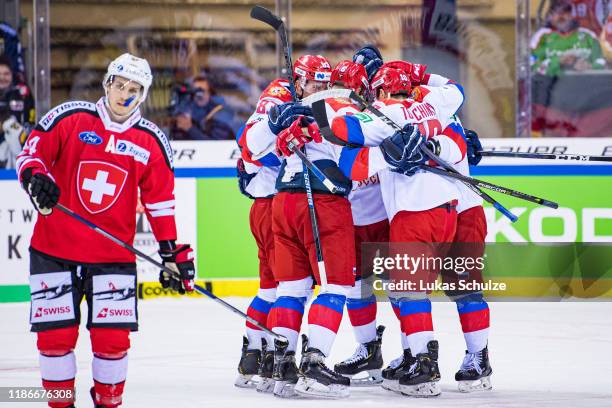 Team Russia celebrate their team's first goal scored by Vladimir Bryukvin during the Deutschland Cup 2019 match between Switzerland and Russia at...