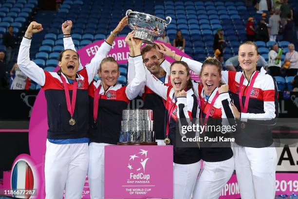 Team France celebrate winning the Fed Cup in the 2019 Fed Cup Final tie between Australia and France at RAC Arena on November 10, 2019 in Perth,...