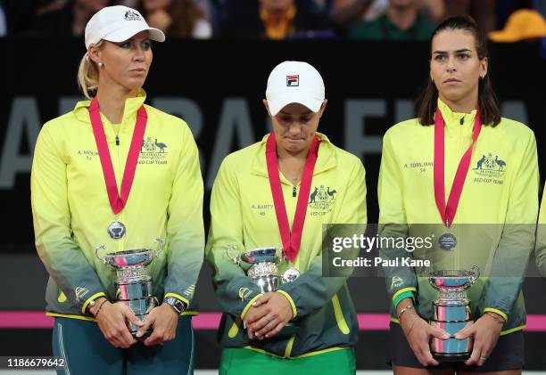 Alicia Molik, Ash Barty and Ajla Tomljanovic of Australia look on after being defeated in the 2019 Fed Cup Final tie between Australia and France at...