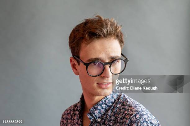 head shot of young adult male with glasses - beauty portrait studio shot stock-fotos und bilder