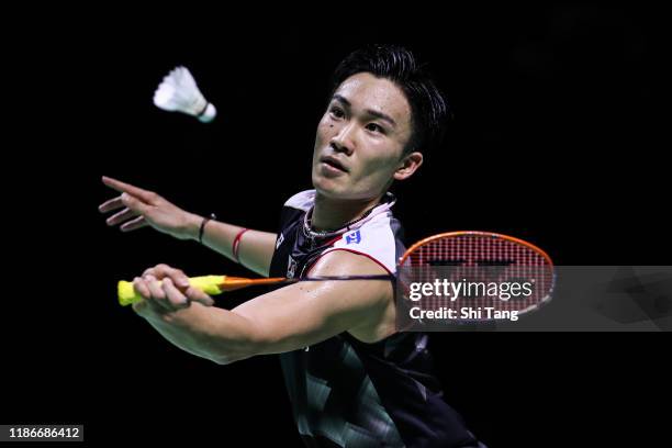 Kento Momota of Japan competes in the Men's Single final match against Chou Tien Chen of Chinese Taipei on day six of the Fuzhou China Open at Haixia...