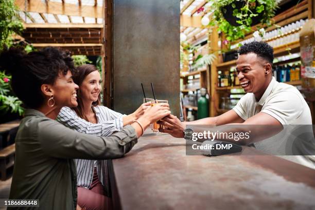 great bartenders make everyone feel like vip - great customer service stock pictures, royalty-free photos & images