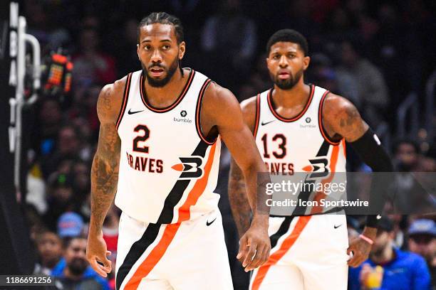 Los Angeles Clippers Forward Kawhi Leonard and Los Angeles Clippers Guard Paul George on defense during a NBA game between the Portland Trail Blazers...