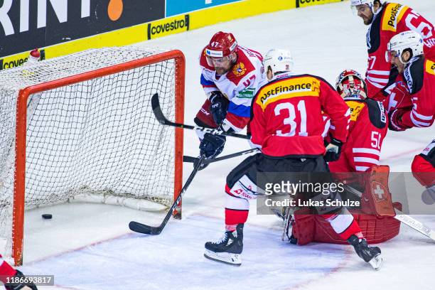 Ivan Igumnov of Russia scores his team's third goal during the Deutschland Cup 2019 match between Switzerland and Russia at Yayla Arena on November...