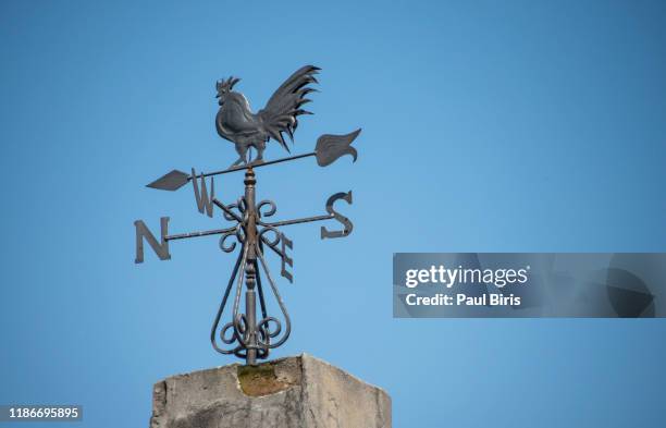 weather vane to indicate wind direction, mokra gora in western serbia - west direction stock pictures, royalty-free photos & images