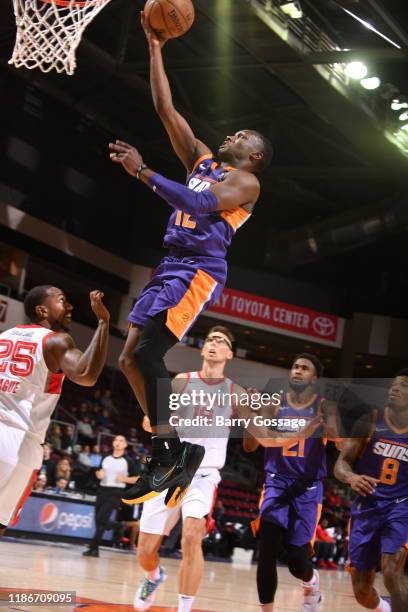 Jared Harper of the Northern Arizona Suns shoots against Marquis Teague of the Memphis Hustle on December 5 at the Findlay Toyota Center in Prescott...